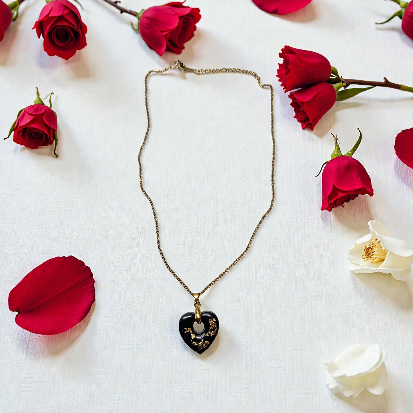 Pendentif coeur noir or